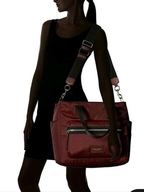Marc Jacobs Baby Diaper Bag in Burgundy. It does not come With Changing Pad.